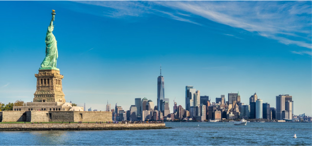 State of Liberty with Manhattan skyline in the background